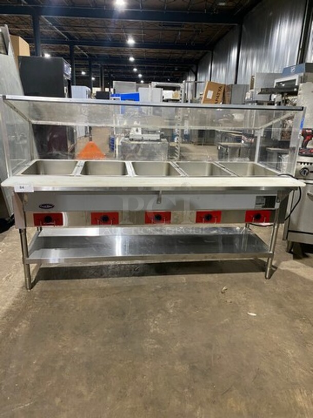 LATE MODEL! LIKE NEW! 2021 Cookrite Commercial Electric Powered 5 Well Steam Table! With Sneeze Guard! With Commercial Cutting Board! With Storage Space Underneath! All Stainless Steel! On Legs! Model: CSTEB5 SN: CSTEB5C2104050004 240V 1 Phase! Working When Removed!