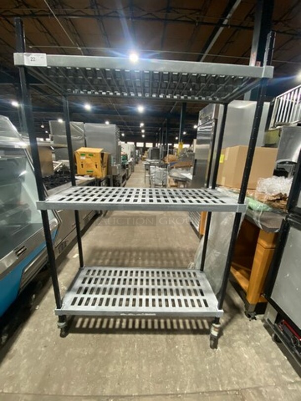 Poly Coated 3 Tier Shelf! On Casters! BUYER MUST DISMANTLE! PCI CANNOT DISMANTLE FOR SHIPPING! PLEASE CONSIDER FREIGHT CHARGES! - Image 1 of 5