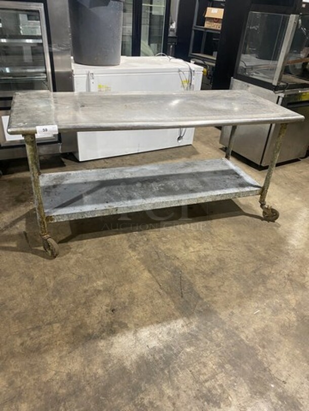 Solid Stainless Steel Work Top/ Prep Table! With Storage Space Underneath! On Casters!