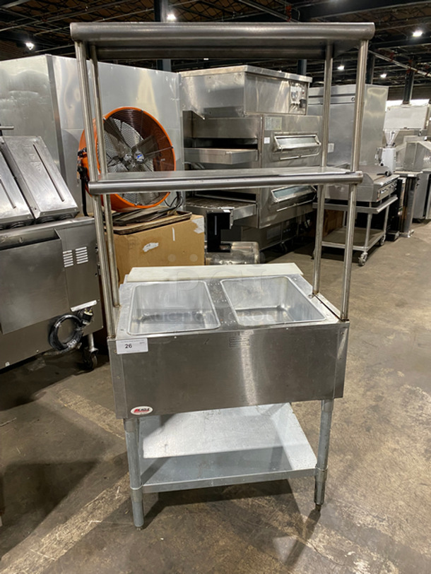 NICE! Eagle Commercial Gas Powered 2 Bay Steam Table! With Commercial Cutting Board! With 2 Over Head Shelves! With Storage Space Underneath! All Stainless Steel! On Legs! Model: HT2NG SN: 1904150004