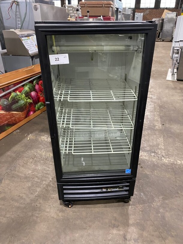 True Commercial Single Door Reach In Refrigerator Merchandiser! View Through Door! With Poly Coated Racks! On Casters! Model: GDM10 SN: 6742361 115V 60HZ 1 Phase