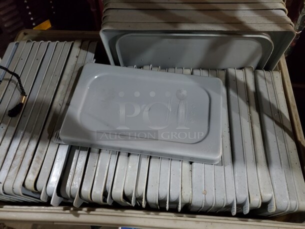 Lot of 10 Rubbermaid Plastic Lids
13 x 7 - Image 2 of 4