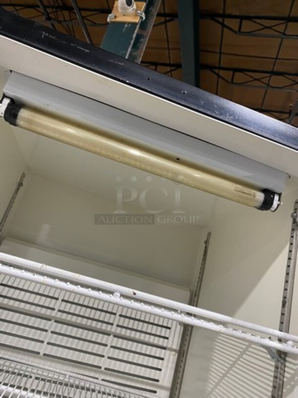 Carrier Commercial Single Door Reach In Cooler Merchandiser! With View Through Door! Poly Coated Racks! Model: MC300 SN: 1908X55666 120V 60HZ 1 Phase - Image 6 of 8