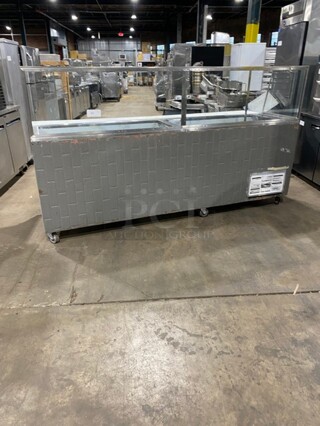 Leader Refrigerated Sandwich/Salad Prep Table! All Stainless Steel! With Glass Food Shield! With Full Length Cutting Board! With 4 Door Rear Cooler Storage Access! With Poly Coated Racks! On Casters! Model: LM96 S/C!