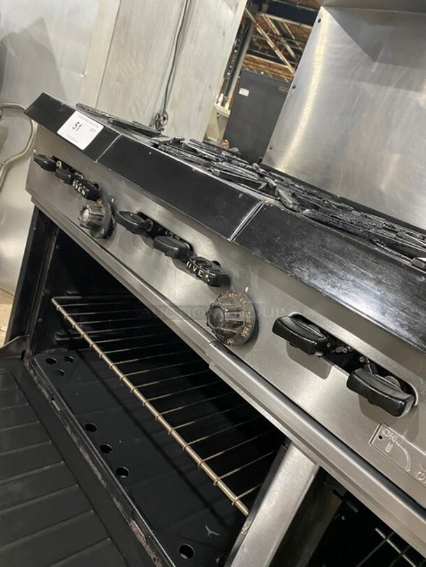 AMAZING! Garland Commercial Natural Gas Powered 6 Burner Split Top With Right Side Flat Griddle! With 2 Full Ovens Underneath! With Back Splash & Overhead Salamander Shelf! All Stainless Steel! With Metal Oven Racks! On Casters!  - Image 11 of 12