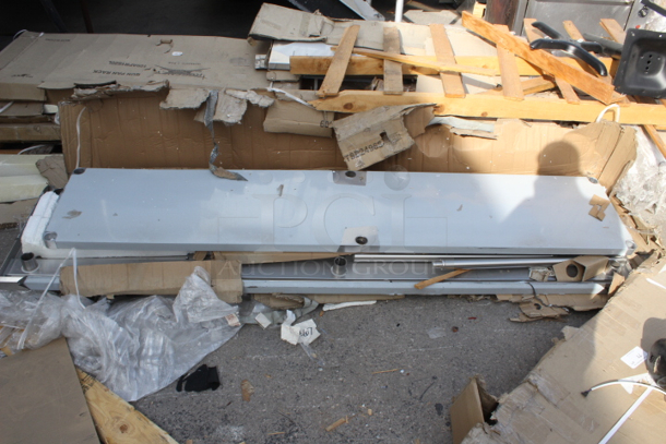 BRAND NEW SCRATCH & DENT! Regency 24" x 96" 16-Gauge Stainless Steel Commercial Work Table with 4" Backsplash and Undershelf. Packaging is damaged. May be missing screws. 	 - Image 3 of 5