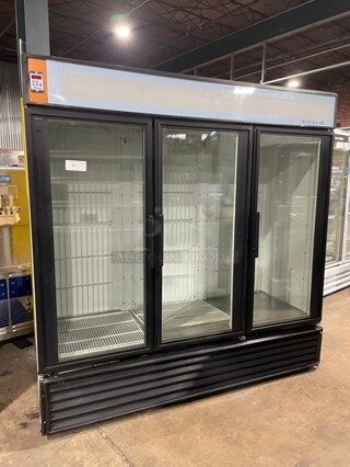 True Commercial Triple Glass Door Refrigerator Merchandiser! With Poly Coated Racks! 115V 1 Phase! Model: GDM-72 SN:1-4383488!