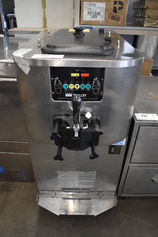 Taylor Model C706-27 Stainless Steel Commercial Air Cooled Single Flavor Soft Serve Ice Cream Machine. 208-230 Volts, 1 Phase. 22x32x40