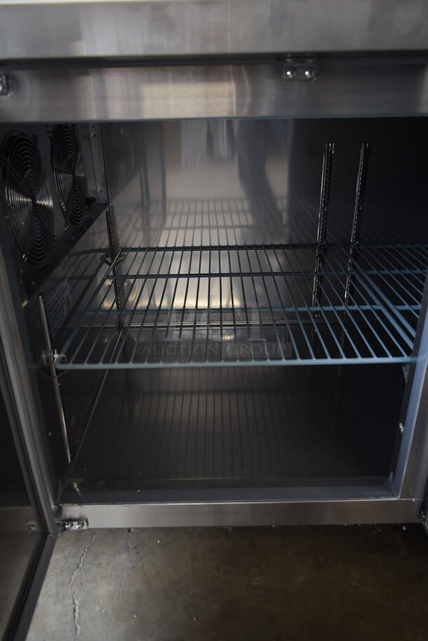 BRAND NEW SCRATCH AND DENT! 2023 Avantco 178SSPPT3 Stainless Steel Commercial Refrigerated Pizza Prep Table on Commercial Casters. 115 Volts, 1 Phase. Tested and Working! - Image 9 of 12