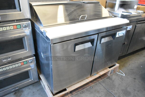 BRAND NEW SCRATCH AND DENT! 2023 Avantco 178APT48HC Stainless Steel Commercial 48" 2 Door Refrigerated Sandwich Prep Table. 115 Volts, 1 Phase. Tested and Working! - Image 8 of 9