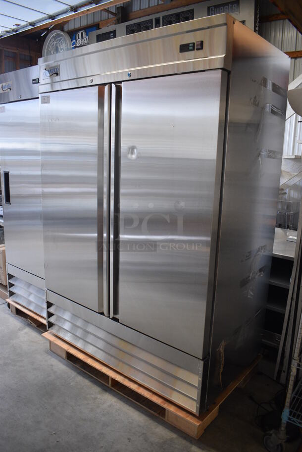 BRAND NEW SCRATCH AND DENT! Avantco Model 178SS2FHC Stainless Steel Commercial Two Door Reach In Freezer w/ Poly Coated Racks on Commercial Casters. 115 Volts, 1 Phase. 54x32x77.5. Tested and Working! - Image 2 of 7