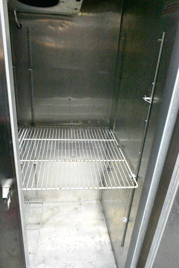 Continental 2F Stainless Steel Commercial 2 Door Reach In Freezer w/ Poly Coated Racks. 115 Volts, 1 Phase. Tested and Powers On But Does Not Get Cold
 - Image 3 of 6