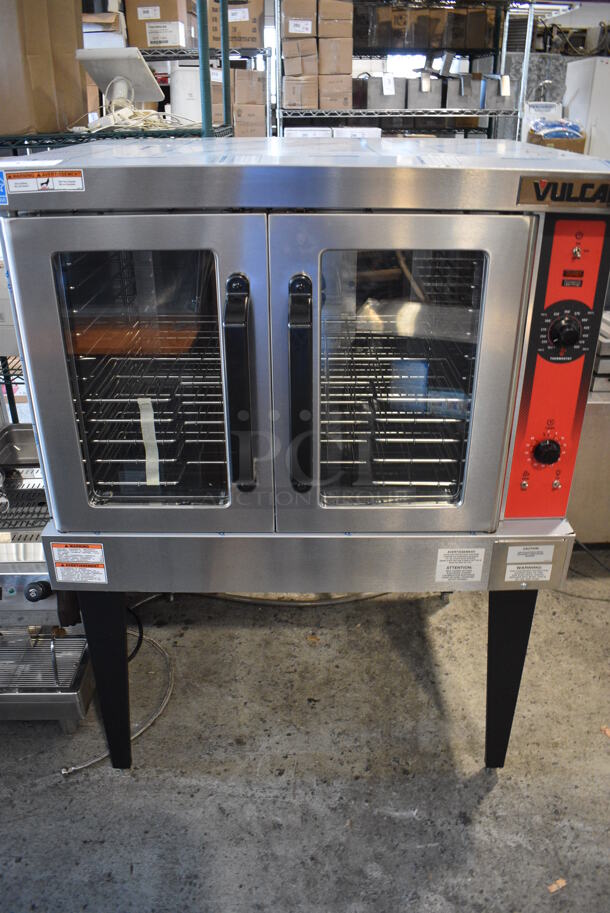 BRAND NEW! Vulcan Model VC4ED Stainless Steel Commercial Electric Powered Full Size Convection Oven w/ View Through Doors, Metal Oven Racks and Thermostatic Controls on Metal Legs. 208 Volts, 3/1 Phase. 40.5x36x55