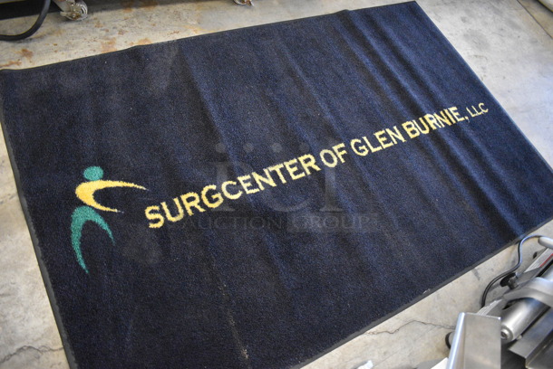 Black Floor Rug w/ Surgcenter of Glen Burnie Logo. 68x43 - Image 3 of 5