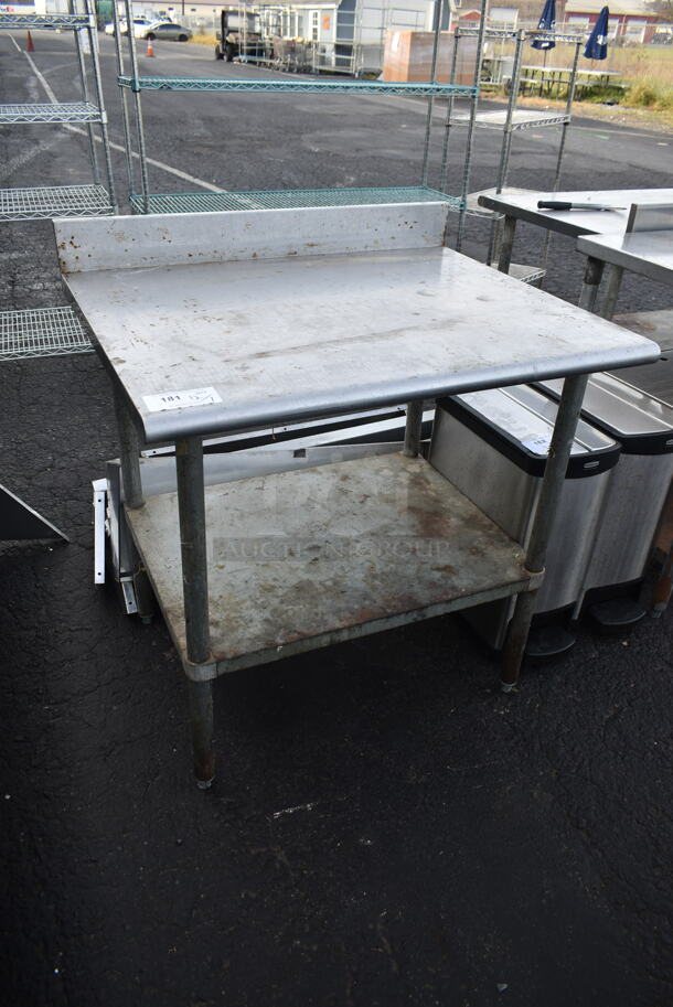 Stainless Steel Commercial Table w/ Back Splash and Under Shelf. - Image 1 of 4