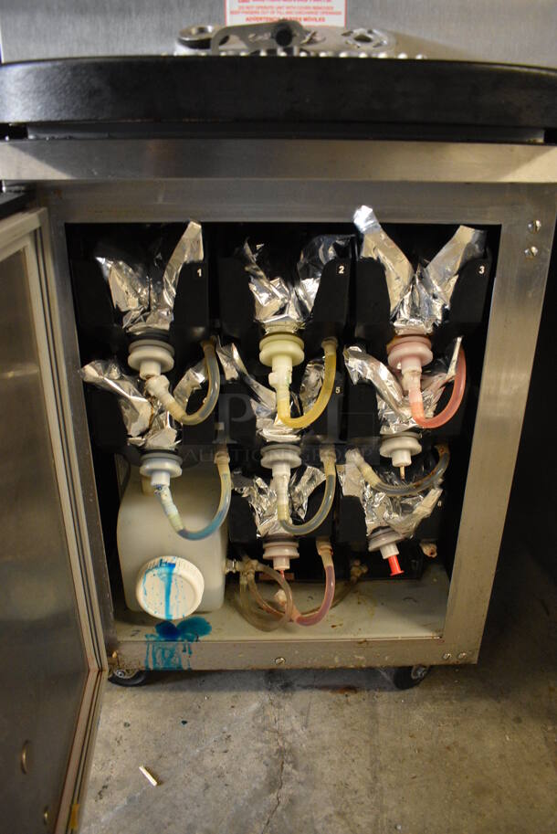 2017 Taylor Model C709-27 Stainless Steel Commercial Air Cooled Single Flavor Soft Serve Ice Cream Machine w/ Taylor Model C20100-WFB 10 Head Flavor Blast and Color Touch Panel for Flavor Burst on Commercial Casters. 208-230 Volts, 1 Phase. 23x33x61 - Image 7 of 10