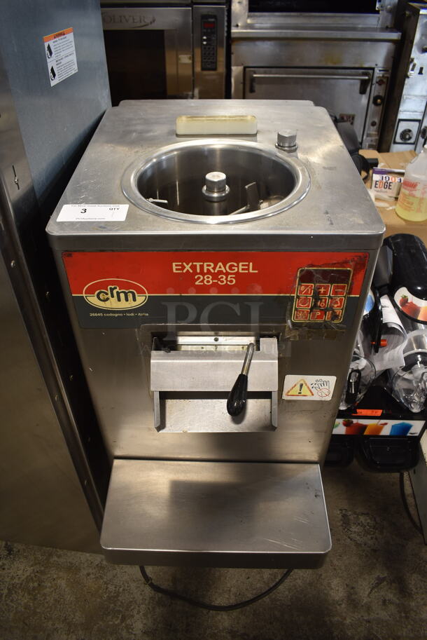 CRM EX28-35A Stainless Steel Commercial Floor Style Air Cooled Batch Freezer on commercial Casters. 220 Volts, 3 Phase. - Image 1 of 10