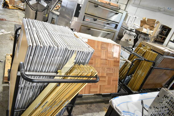LOT of Approximately 61 Sico Cam-Lock Portable Dance Floor Pieces, Gold Trim Pieces and 3 Black Carts. Makes an Approximately 24'x21' Floor.  - Image 1 of 11