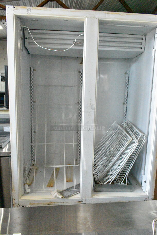 Frigidaire ULG50BD-4 Metal Commercial 2 Door Reach In Freezer Merchandiser. Doors Need To Be Reattached. 115/208-230 Volts, 1 Phase.  - Image 4 of 5