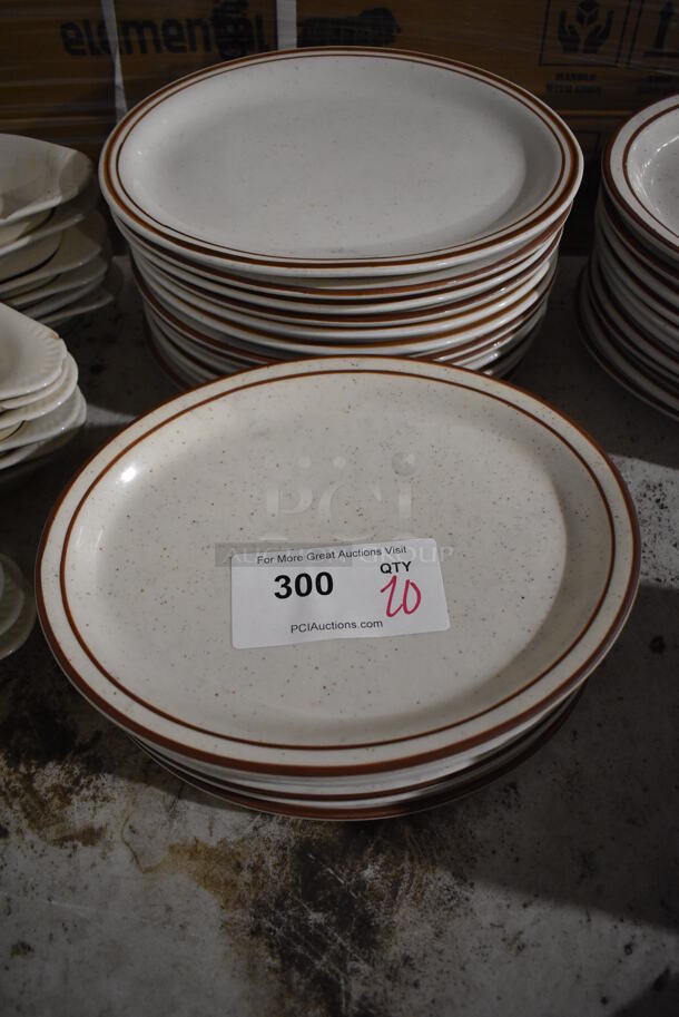 20 White Ceramic Oval Plates w/ Brown Lines on Rim. 11.5x9x1. 20 Times Your Bid!