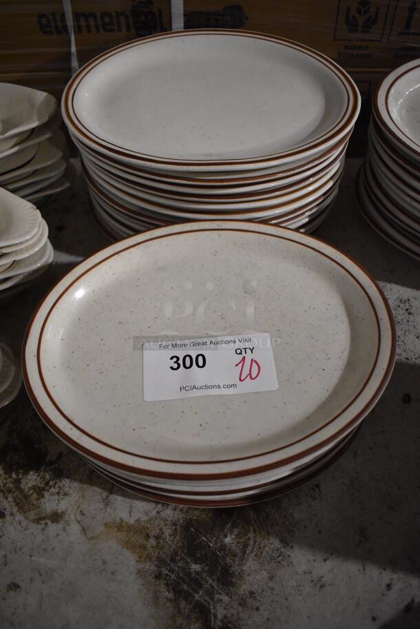 20 White Ceramic Oval Plates w/ Brown Lines on Rim. 11.5x9x1. 20 Times Your Bid! - Image 1 of 3