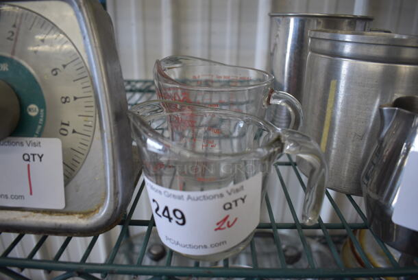 2 Glass Measuring Cups. 5x3.5x4, 6x4.5x4.5. 2 Times Your Bid! - Image 1 of 3