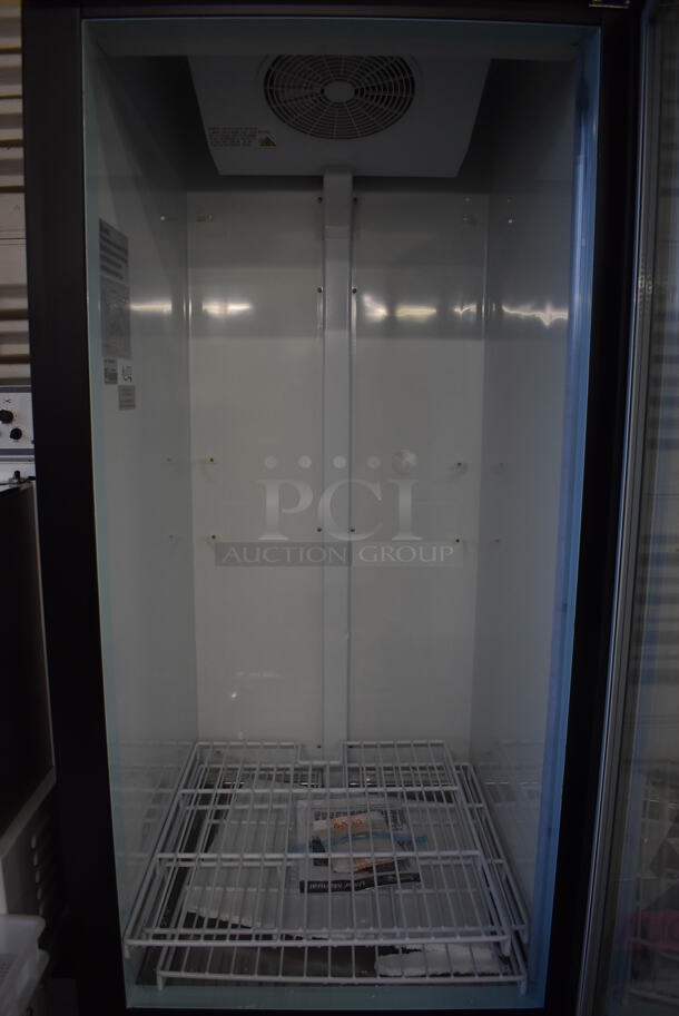 BRAND NEW SCRATCH AND DENT! Avantco 178GDICE24FB Metal Commercial Single Door Reach In Ice Freezer Merchandiser on Commercial Casters. 115 Volts, 1 Phase. 31x33x87. Tested and Working! - Image 4 of 7