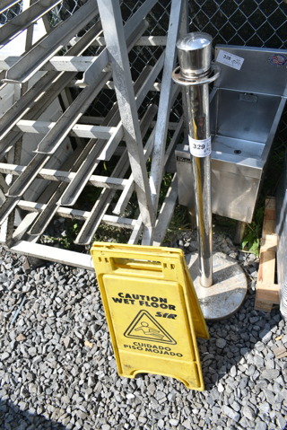 2 Items; Metal Stanchion and Poly Wet Floor Caution Sign. 2 Times Your Bid! 