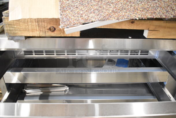 BRAND NEW SCRATCH AND DENT! 2023 Avantco 178CBE84HC Stainless Steel Commercial 4 Drawer Refrigerated Chef Base on Commercial Casters. 115 Volts, 1 Phase. Tested and Working! - Image 7 of 8