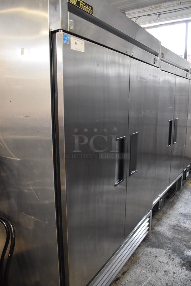 2013 True T-49F ENERGY STAR Stainless Steel Commercial 2 Door Reach In Freezer w/ Poly Coated Racks on Commercial Casters. 115 Volts, 1 Phase. Tested and Working!