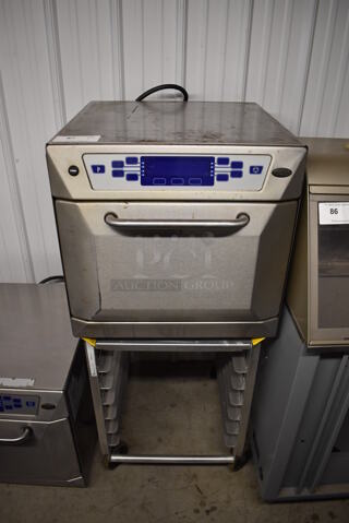 Merrychef 402S Stainless Steel Commercial Countertop Electric Powered Rapid Cook Oven w/ Lockwood Metal Commercial Pan Transport Rack on Commercial Casters. 208/240 Volts, 1 Phase. 23x31x53