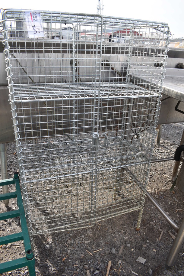 Chrome Finish 4 Tier Wire Shelving Unit w/ Liquor Cage. BUYER MUST DISMANTLE. PCI CANNOT DISMANTLE FOR SHIPPING. PLEASE CONSIDER FREIGHT CHARGES. 27x14x48
