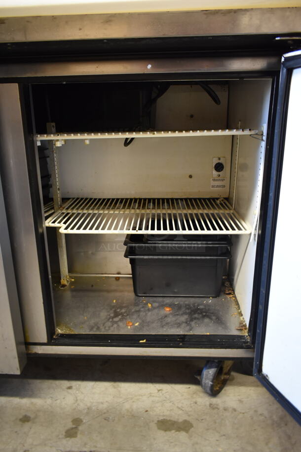 True TSSU-72-18 Stainless Steel Commercial Sandwich Salad Prep Table Bain Marie Mega Top w/ Black Poly Drop In Bins on Commercial Casters. 115 Volts, 1 Phase. Tested and Powers On But Does Not Get Cold - Image 7 of 8