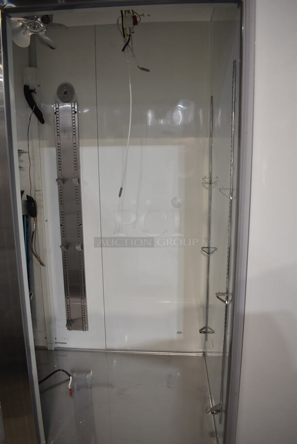BRAND NEW SCRATCH AND DENT! 2023 Avantco 178A49FHC Stainless Steel Commercial 2 Door Reach In Freezer w/ Poly Coated Racks on Commercial Casters. 115 Volts, 1 Phase. Tested and Does Not Power On - Image 5 of 10