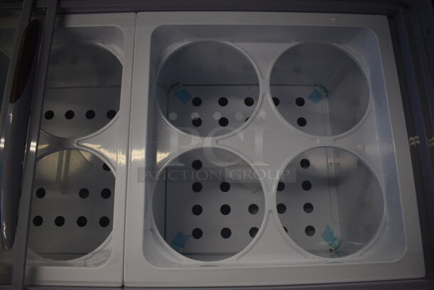 BRAND NEW SCRATCH AND DENT! Avantco ADC-12C-HC Curved Glass Ice Cream Dipping Cabinet - 71" on Commercial Casters 115 Volt, 1 Phase. Tested and Working! - Image 5 of 10