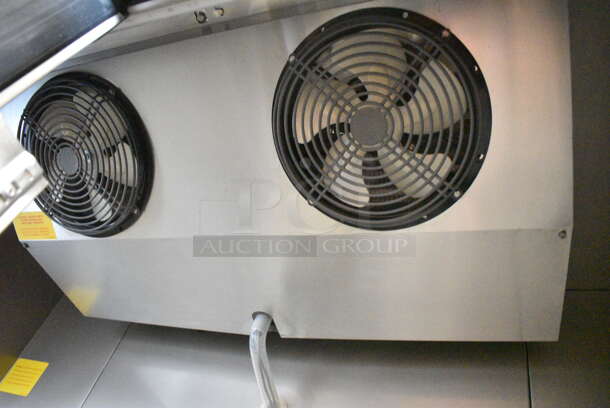 BRAND NEW SCRATCH AND DENT! 2023 Avantco 447AP49F Stainless Steel Commercial 55 3/8" Stainless Steel Solid Door Reach-In Freezer w/ Poly Coated Racks. 115 Volts, 1 Phase. Tested and Working! - Image 5 of 7