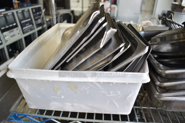 ALL ONE MONEY! Lot of 4 Tiers of Various Items Including Stainless Steel Drop In Bins, Pizza Screens, Stainless Steel Lids. Does Not Include Shelving Unit.  - Image 7 of 12
