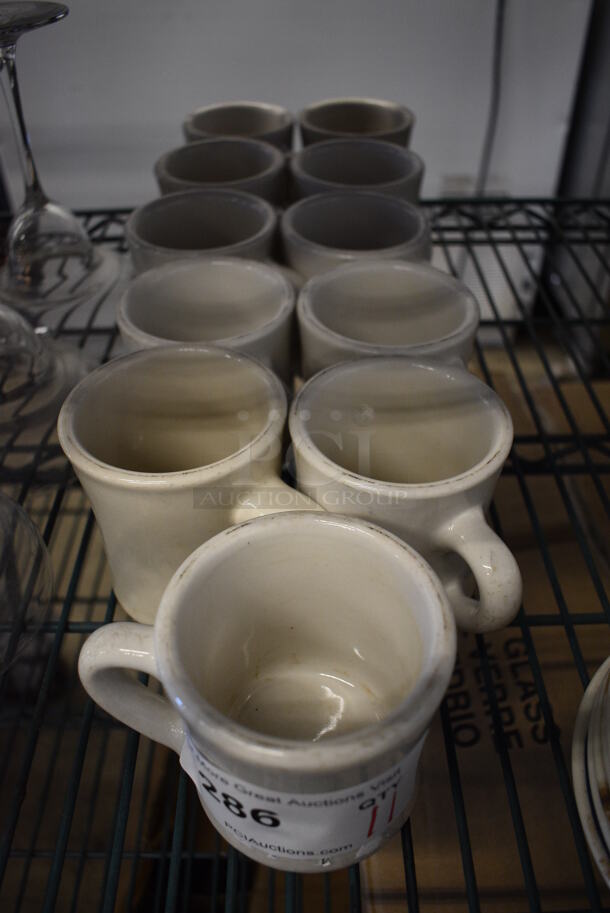 11 White Ceramic Mugs. 4.5x3.5x3.5. 11 Times Your Bid! - Image 2 of 3