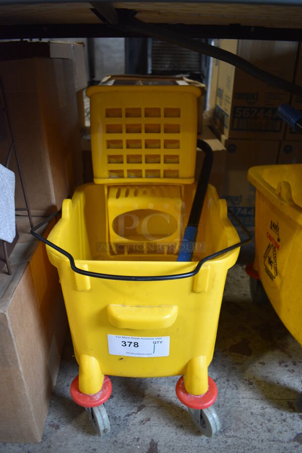 Yellow Poly Mop Bucket w/ Wringing Attachment on Commercial Casters. 13x22x25 - Image 1 of 2
