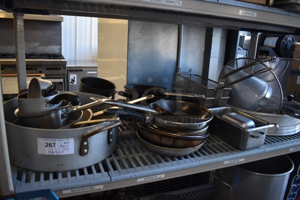 ALL ONE MONEY! Tier Lot of Various Items Including Metal Skillets, Metal Stock Pot, Fry Baskets, China Cap Strainer