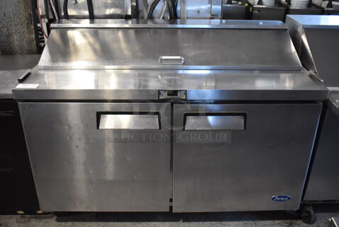 Atosa Stainless Steel Commercial Sandwich Salad Prep Table Bain Marie Mega Top on Commercial Casters. 115 Volts, 1 Phase. 60.5x30x44.5. Cannot Test Due To Cut Power Cord