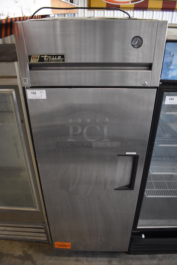 2010 True TG1R-1S Stainless Steel Commercial Single Door Reach In Cooler w/ Poly Coated Racks on Commercial Casters. 115 Volts, 1 Phase. 29x30x83. Tested and Working!
