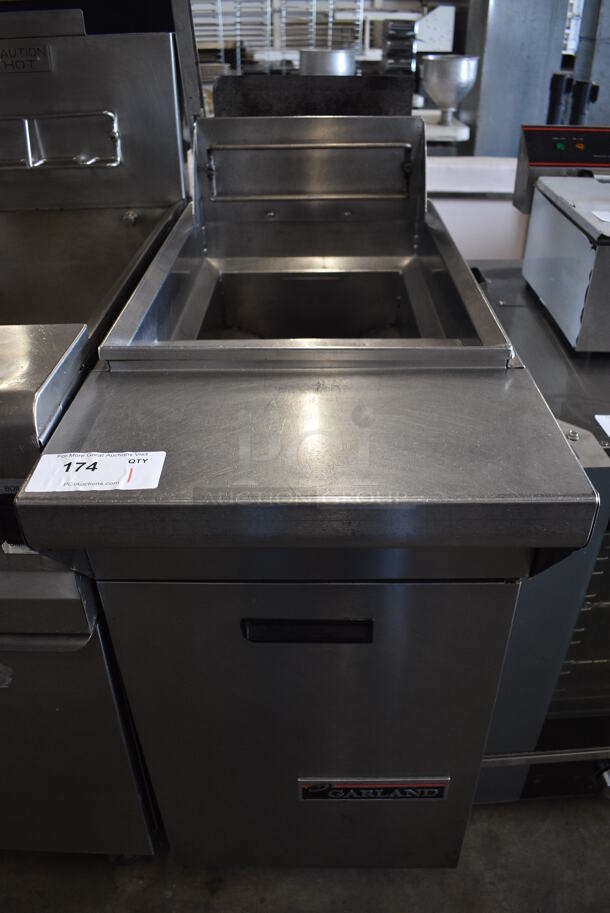 Garland Model M35SS Stainless Steel Commercial Floor Style Natural Gas Powered Deep Fat Fryer on Commercial Casters. 110,000 BTU. 17x38x50
