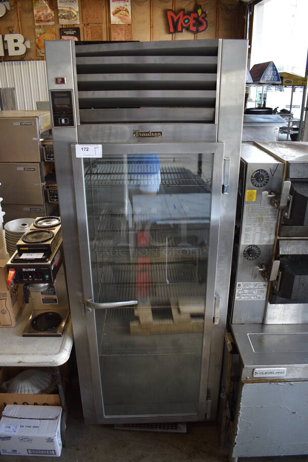 Traulsen Model UR 30 WT Stainless Steel Commercial Single Door Reach In Cooler Merchandiser w/ Racks on Commercial Casters. 115 Volts, 1 Phase. 30x26x81. Tested and Does Not Power On