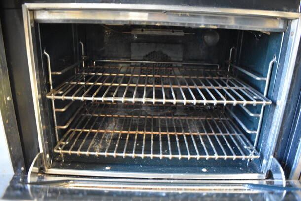 Wolf Stainless Steel Commercial Natural Gas Powered 4 Burner Range w/ Flat Top, Charbroiler, Convection Oven, Warmer, Over Shelf and Back Splash. 48x28x57 - Image 6 of 11