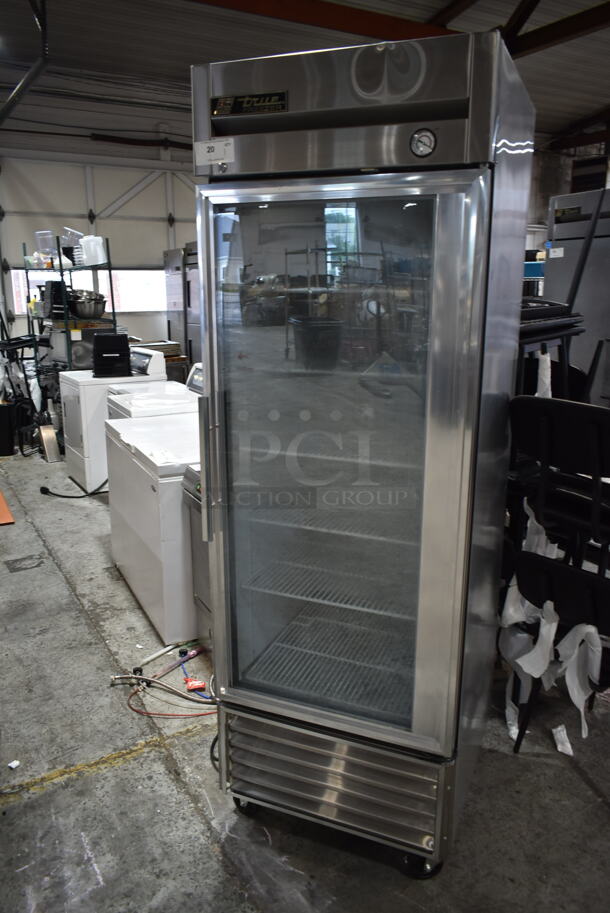 True T-23FG Stainless Steel Commercial Single Door Reach In Cooler Merchandiser w/ Poly Coated Racks on Commercial Casters. 115 Volts, 1 Phase. Tested and Powers On But Does Not Get Cold - Image 1 of 4