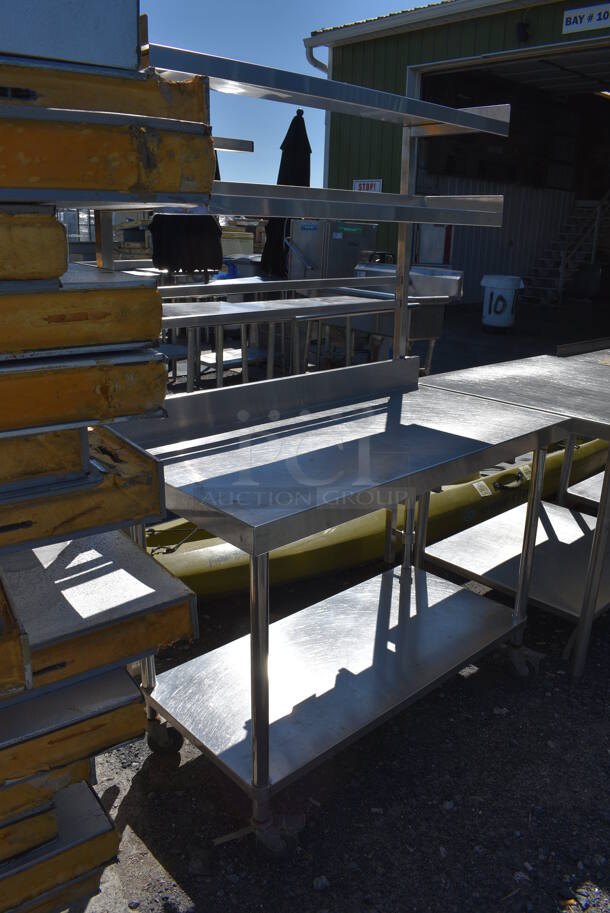 Stainless Steel Table w/ Backsplash, Under Shelf and 2 Over Shelves on Commercial Casters. 47.5x24x79