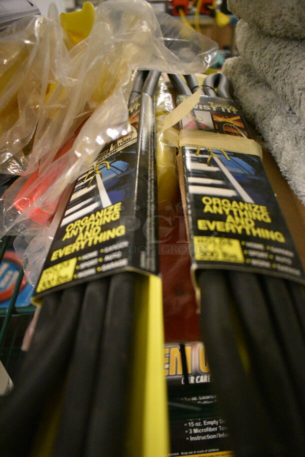 ALL ONE MONEY! Tier Lot of Various Items Including Towels, Handset Cord, Organizing Ties, Squeegees With Rubber Blade, and Estate Wine Toe - Image 4 of 6