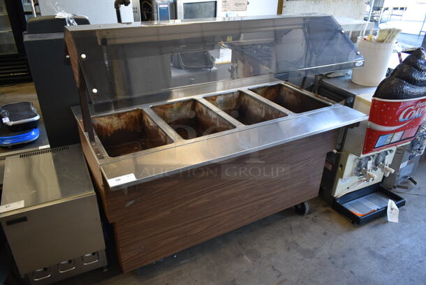 Duke Stainless Steel Commercial Electric Powered 4 Bay Steam Table w/ Sneeze Guard on Commercial Casters. - Image 1 of 9
