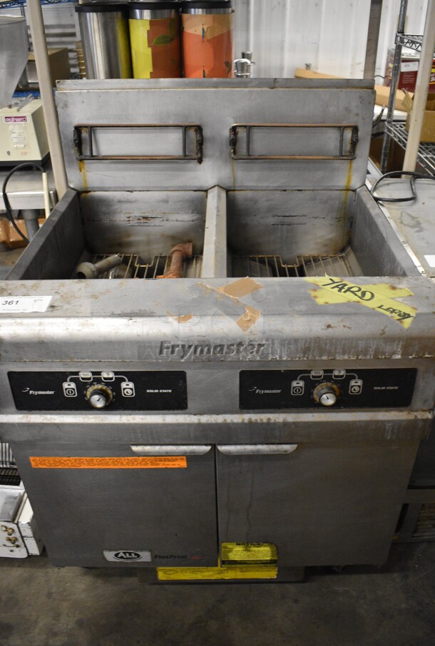 2011 Frymaster Model FPPH255SC Stainless Steel Commercial Natural Gas Powered 2 Bay Deep Fat Fryer on Commercial Casters. 80,000 BTU. 31x30x47